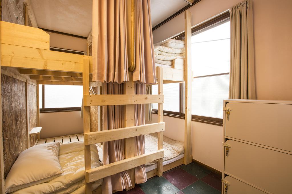 Guest House Sato Shoten Toyoura Bagian luar foto