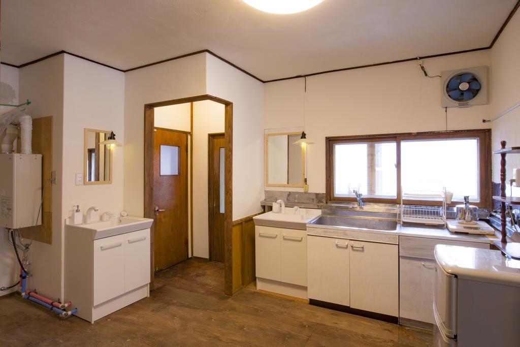 Guest House Sato Shoten Toyoura Bagian luar foto